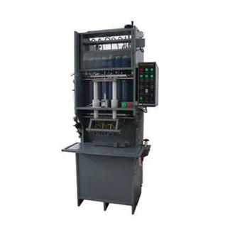 एसिड भरने की मशीन